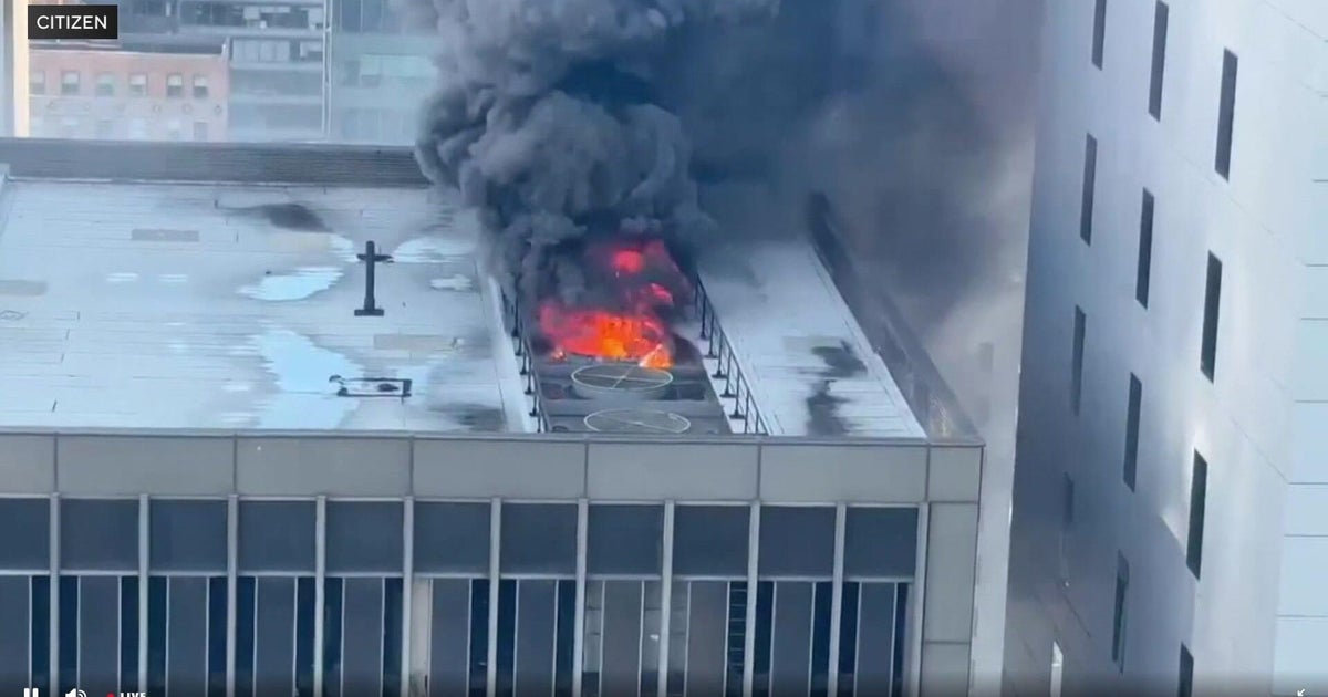FDNY fighting fire in Midtown Manhattan near the beginning of the NYC St. Patrick’s Day Parade